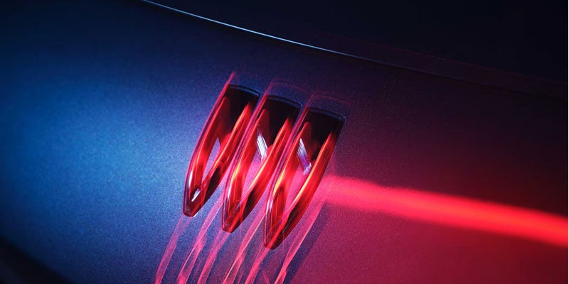Close-up of 2026 Buick Envista LED taillight design with red illumination